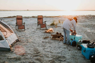 beach campsite with water in background