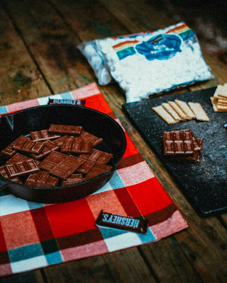 cast iron camping recipes melting hershey chocolate bars in skillet